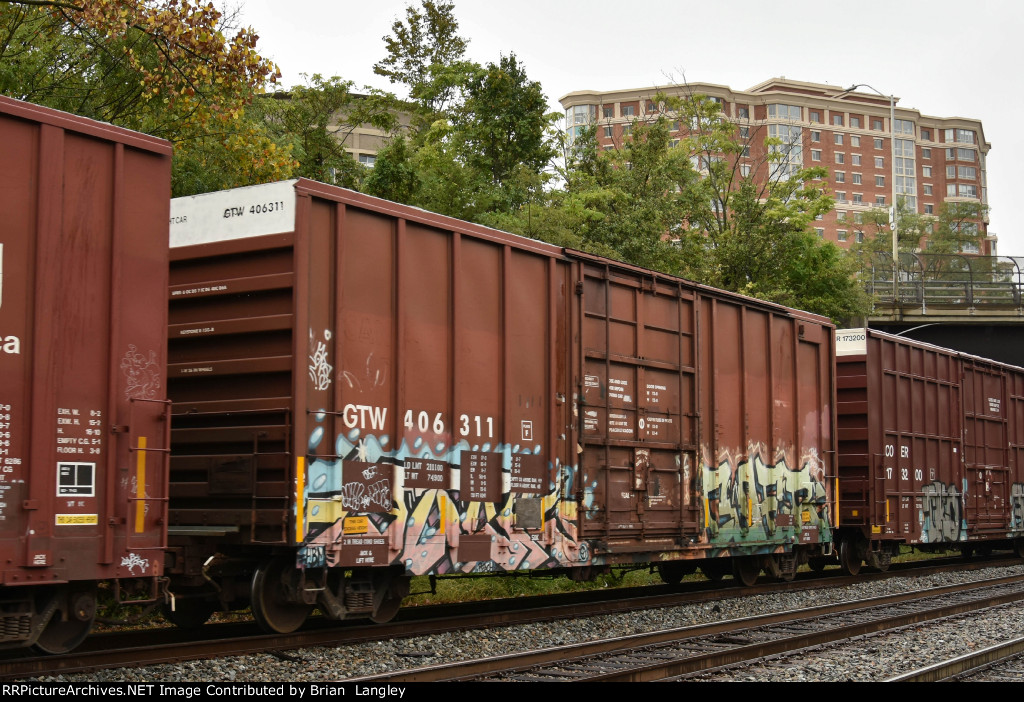 406311